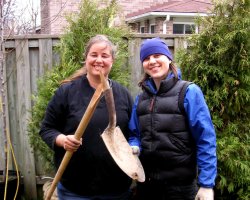 beth and alex with a broken shovel