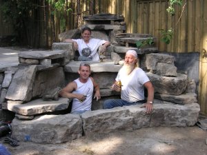 the guys in the fountain drinking beer